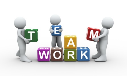 3d rendering of people placing team work text cubes. 3d white people man character